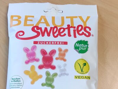 Weiße Verpackung der Beauty Sweeties mit bunter Aufschrift.